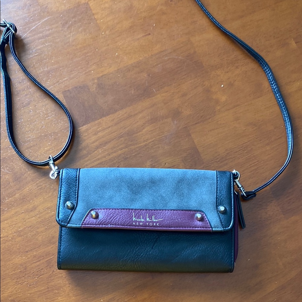 Nicole Miller Black and Purple Crossbody Bag with Flap Closure